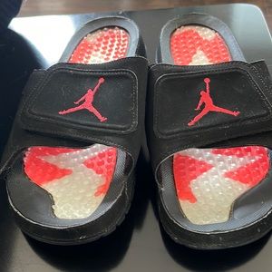 Jordan slides size 81/2-9.  Adjustable straps